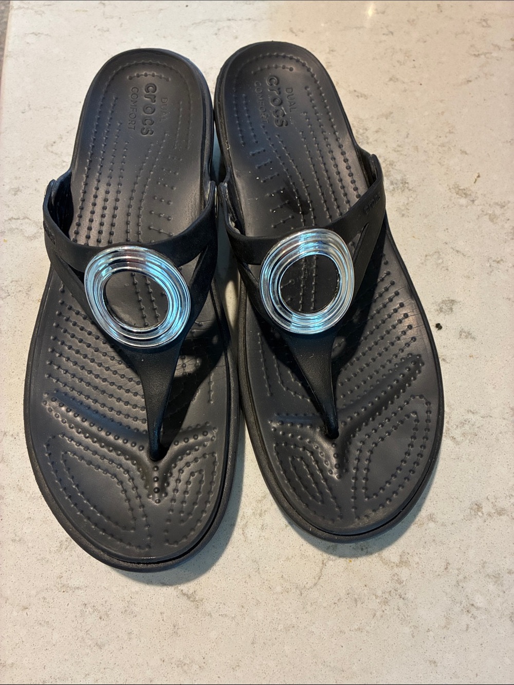 CROCS Women’s Black Thong Sandals with Silver Ring Accent